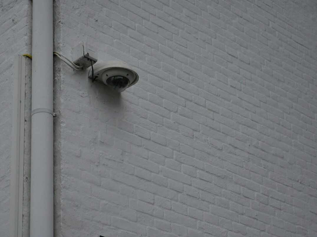 security camera on wall
