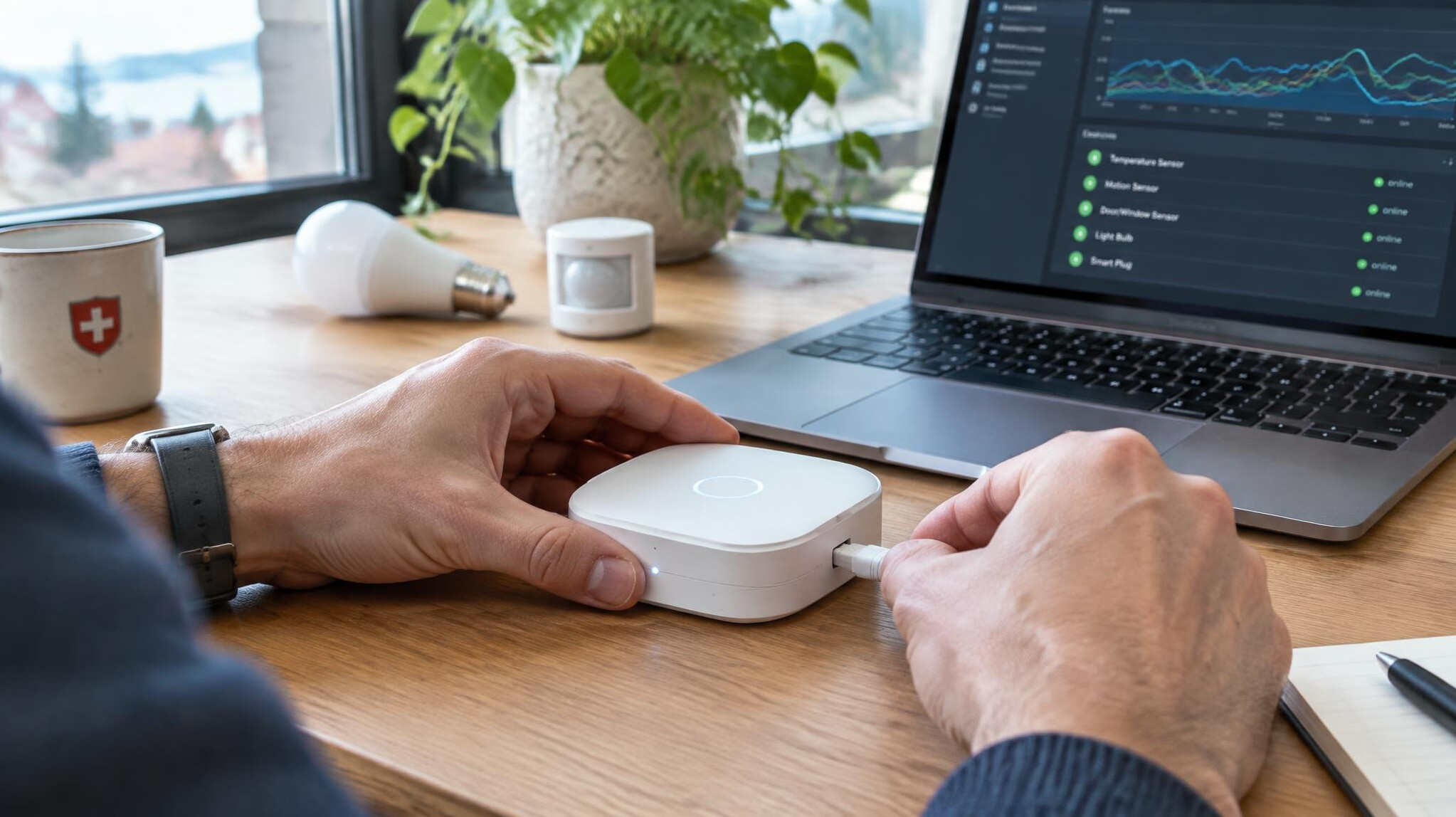 Hands holding and testing a smart home hub device